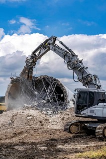 Demolished tower of a 20 year old wind turbine, in the Werl wind farm, 5 old Enercon E-66 turbines