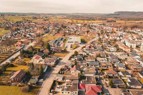 Suburban view with modern houses and good road infrastructure in rural surroundings, Ötisheim,