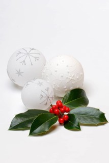 Holly branch and Christmas baubles