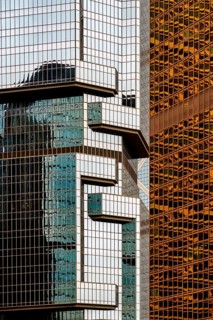 Architectural details showcasing the intricate geometric patterns and reflective surfaces of modern
