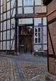 Half-timbered houses in the Finkenherd alley with cobblestones, Old Town of the World Heritage town