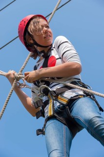 Young girl in climbing park, climbing, action, safety, belay, belay rope, belay technique, belay