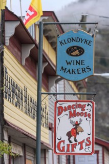 Signs on a shop, souvenir shop, Dawson City, Yukon, Canada