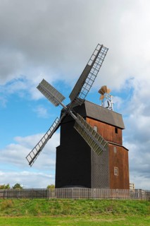 Wooden windmill with blue sky and clouds in the landscape, Paltrock windmill, Parey, Elbe-Parey,