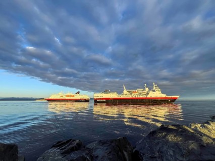 Meeting of two ships on the Hurtigroute, Vesterålen and Nordkapp, morning light, sunrise, clouds,