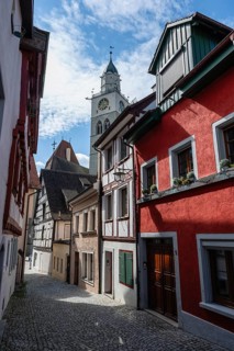 The Luziengasse with lined half-timbered houses and the bell tower of Überlinger Münster in the