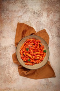 Penne pasta, with shrimp in tomato sauce, close-up, no people
