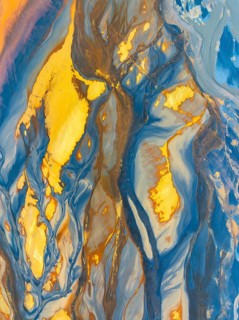 From above, this aerial drone captures the stunning interplay of blue and gold abstract nature