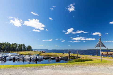 Small harbor with pleasure boats on the shores of Lake Siljan near Tällberg, Dalarnas län, Sweden