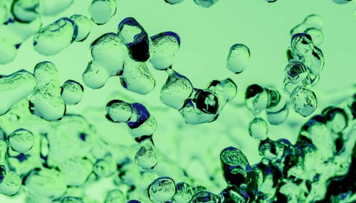 This image features a cluster of 3D liquid spheres intertwined, rendered in an abstract style with