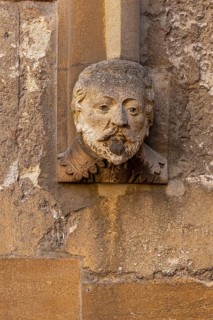 Head carved in stone, portrait, Bodleian Library, inner courtyard, Old Schools Quadrangle, Oxford,