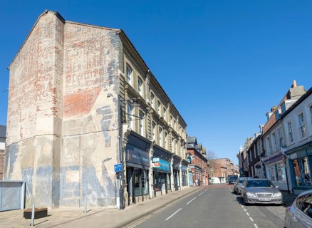Historic buildings and shops on High Street, Lowestoft, Suffolk, England, UK