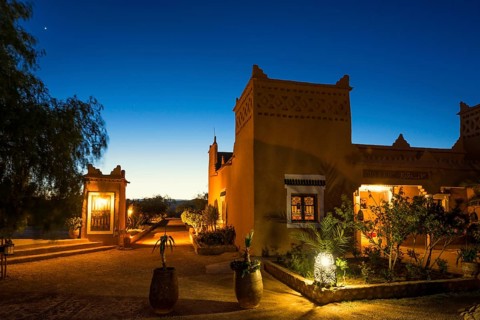 Kasbah style hotel, blue hour, Boumalne Dades, Dades Valley, Atlas Mountains, Morocco