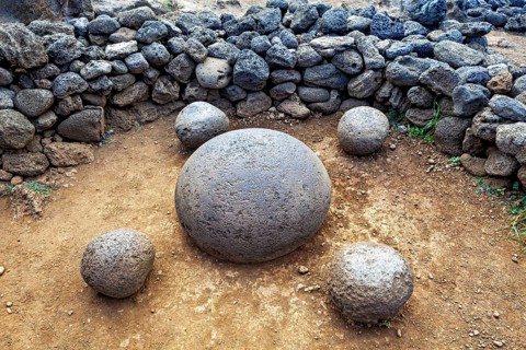 A circular arrangement of round stones surrounded by a wall of irregular stones, The Magnetic