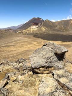 On the hiking trail of the Tongariro Alpine Crossing in Tongariro National Park with a view of the