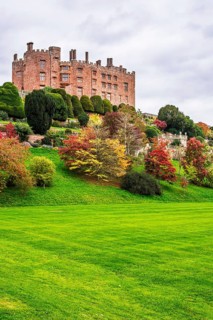 Autumn colors over Powis Castle and Garden, Welshpool, Powys, Wales, UK