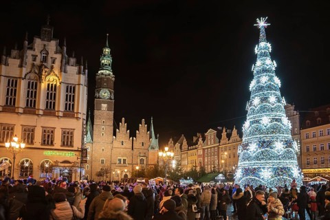 WROCLAW, POLAND - DECEMBER 09, 2018: Christmas fair in the market square of Wroclaw with the city