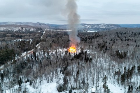 House fire in a forest area, Region of La Mauricie, Province of Quebec, Canada