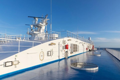 Upper deck in blue and white, TT-Line ferry Nils Holgersson crossing the Baltic Sea from Rostock in