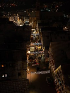 Top view of a Christmas market at night with illuminated facades, Christmas market Calw, Black