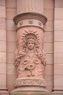 Relief figure with post horn on column, Old Post Office built in 1893, detail, decorations, red,
