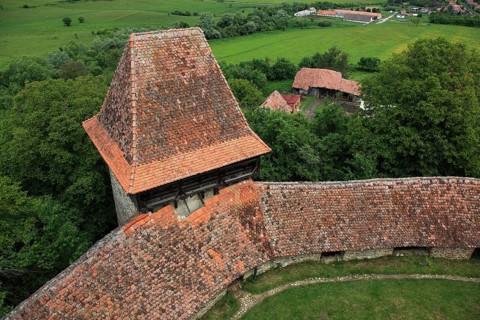 Romania, view from the church tower of the defensive wall and tower of the fortified church of