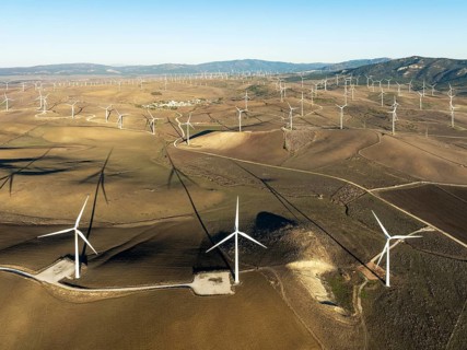 Windmills on a wind farm near Zahara de los Atunes. Aerial view. Drone shot. Cádiz province,