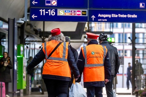 Berlin Central Station. S-Bahn account manager wearing uniform and safety vest. Berlin, Germany