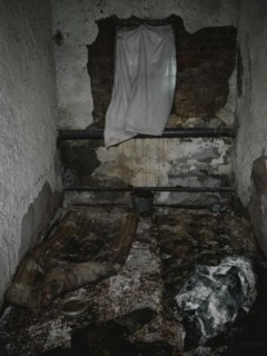 Cell in the basement of the police station. After the occupation of the city by the Russian army,