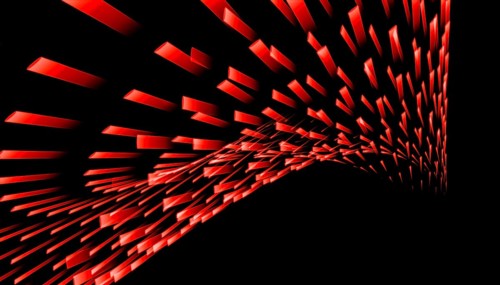 Dynamic red light pattern against a black background creating a sense of motion. This abstract