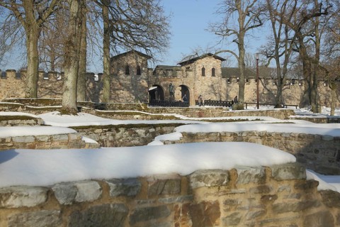 Roman UNESCO fort Saalburg in winter with snow, foundations, Upper Germanic Rhaetian Limes, Bad