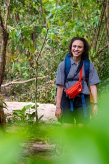 Young tourist on a path in the jungle in Cahuita National Park, Costa Rica