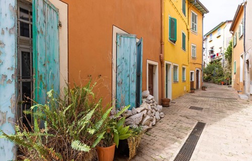 France, French Riviera, Villefranche old city streets in historic city center near sea promenade