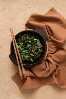 Fried bean pods, in soy sauce, with sesame seeds, homemade, no people