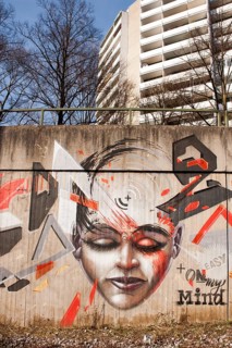 Graffiti woman's face, text: easy on my mind, wall in front of residential building, Munich,