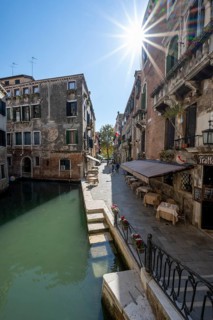Restaurant Trattoria al Ponte del Meglio on a canal, Sun Star, Venice, Veneto, Italy