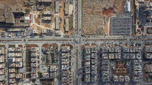 In Aleppo, Syria on February 10, 2026, a breathtaking top-down aerial drone shot captures the urban