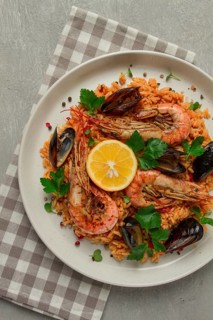 Seafood paella, shrimp and mussels risotto, rice, homemade, top view, no people