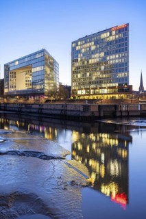 Mirror House on Ericusspitze at Blue Hour with Reflection in the Fleet, Hamburg, Germany
