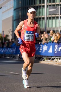 Guojian Dong China on Potsdamer Platz at the 50th BMW Berlin Marathon 2024 on 29 September 2024