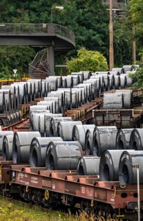 Strip steel coils, on freight wagons, at the ThyssenKrupp Steel plant Schwelgern in