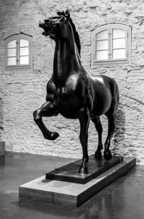 Black and white photograph, bronze sculpture of striding horses, Proviantmagazin Zitadelle Spandau,