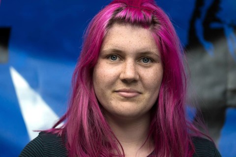 Portrait of a young woman with freckles and violet-colored hair, Ringsheim, Baden-Württemberg,