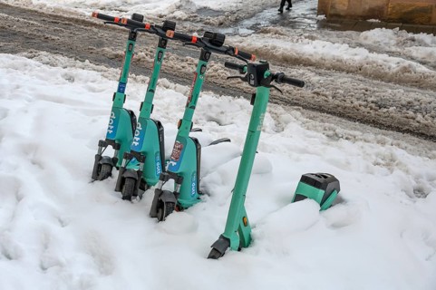 Parked, snow-covered scooters, Nuremberg, Middle Franconia, Bavaria, Germany