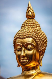 Golden plated Buddha statue in Wat Phra That Doi Suthep, Chiang Mai, Thailand