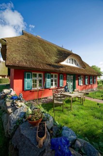 Old traditional fisherman's house with the figure of a fisherman, Ahrenshoop, Fischland-Darß-Zingst