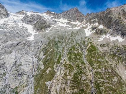 Hiking path from La Fouly to Cabane de Neuve, glacial stream, aerial view, valley Val Ferret,