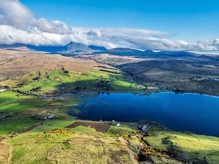 Farms and Moors over Loch Harport from a drone, Drynoch, Isle of Skye, Highlands, Scotland, United