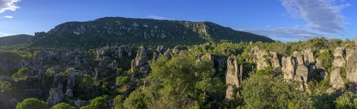 Panoramic view of the rocks in the evening light from the Belvedere, Mourèze, Département Hérault,