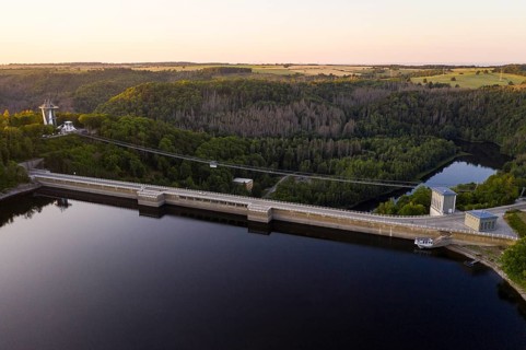 Aerial view of the Rappbode dam, dam wall and suspension bridge by Harzdrenalin, Oberharz am
